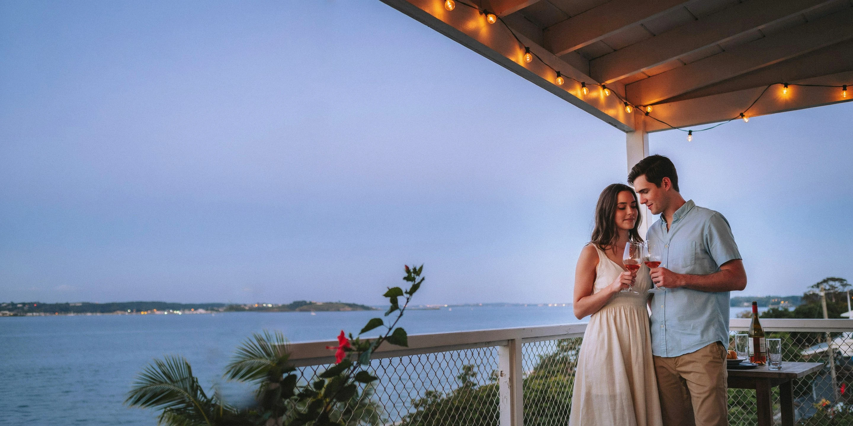 Couple on a screened lanai at dusk on the Braden River, Mote Ranch, FL