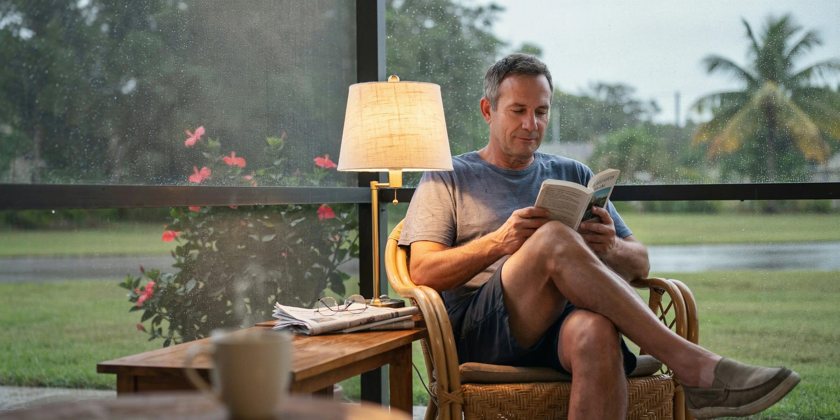 Reading on a screened lanai in Sara Bay, Sarasota, FL