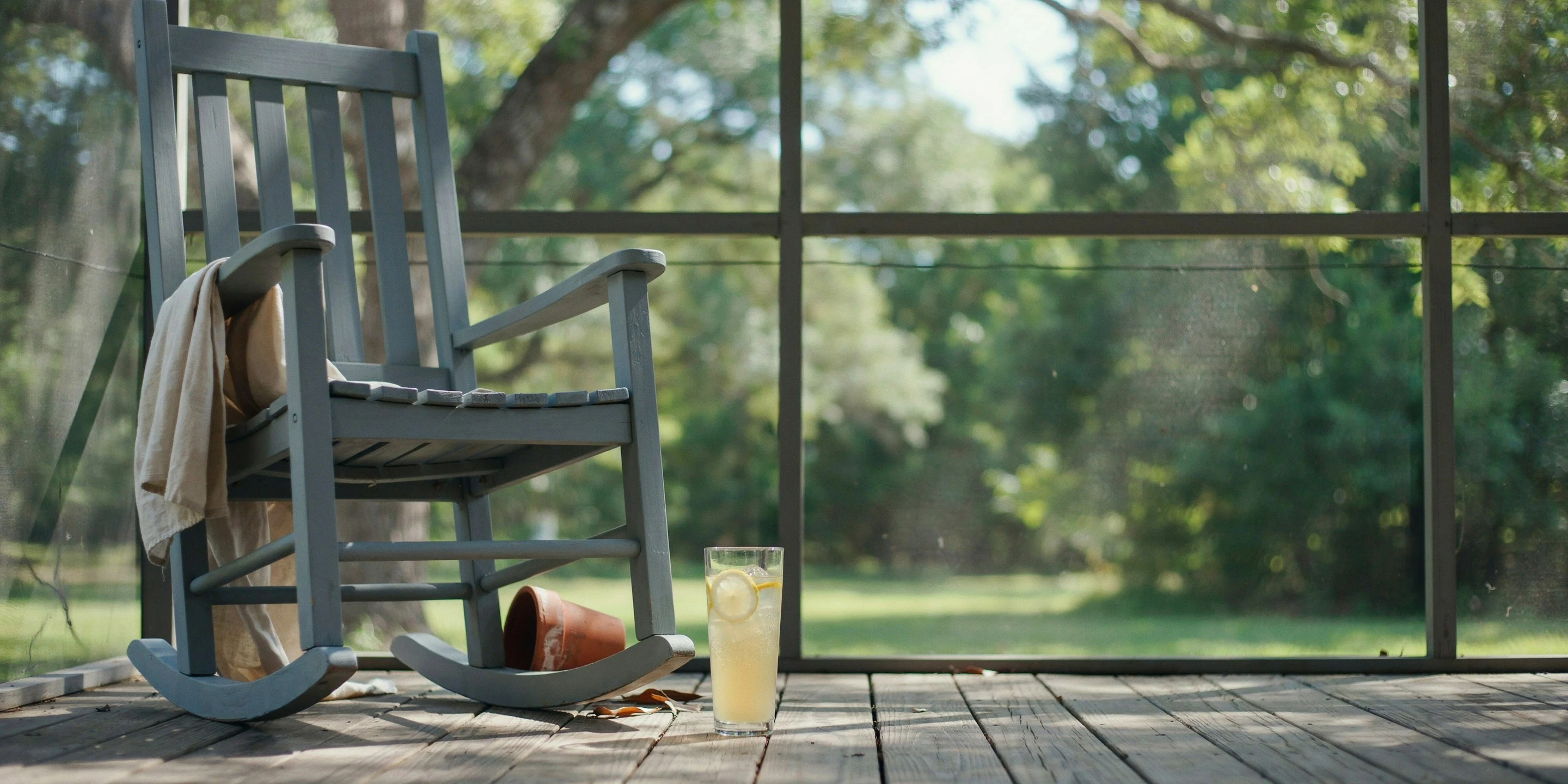 Rocking chair on a screened porch in Whitfield Estates, FL